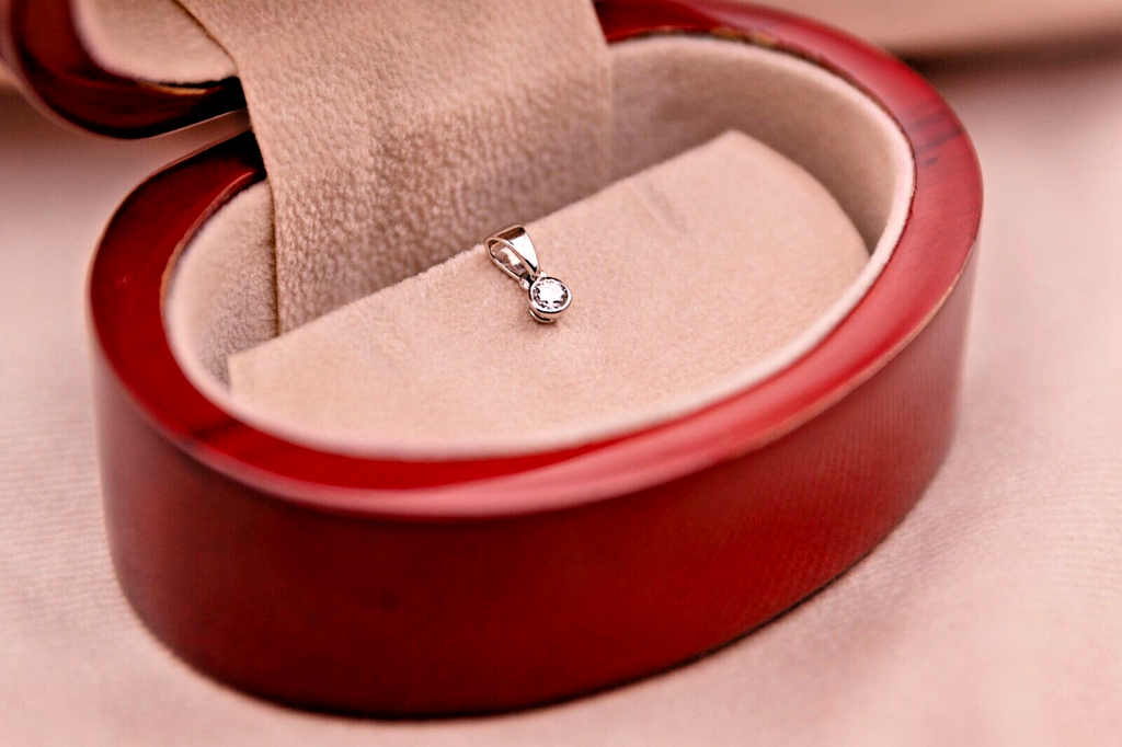 White Gold 0.15ct Rubover Set Diamond Pendant 18ct