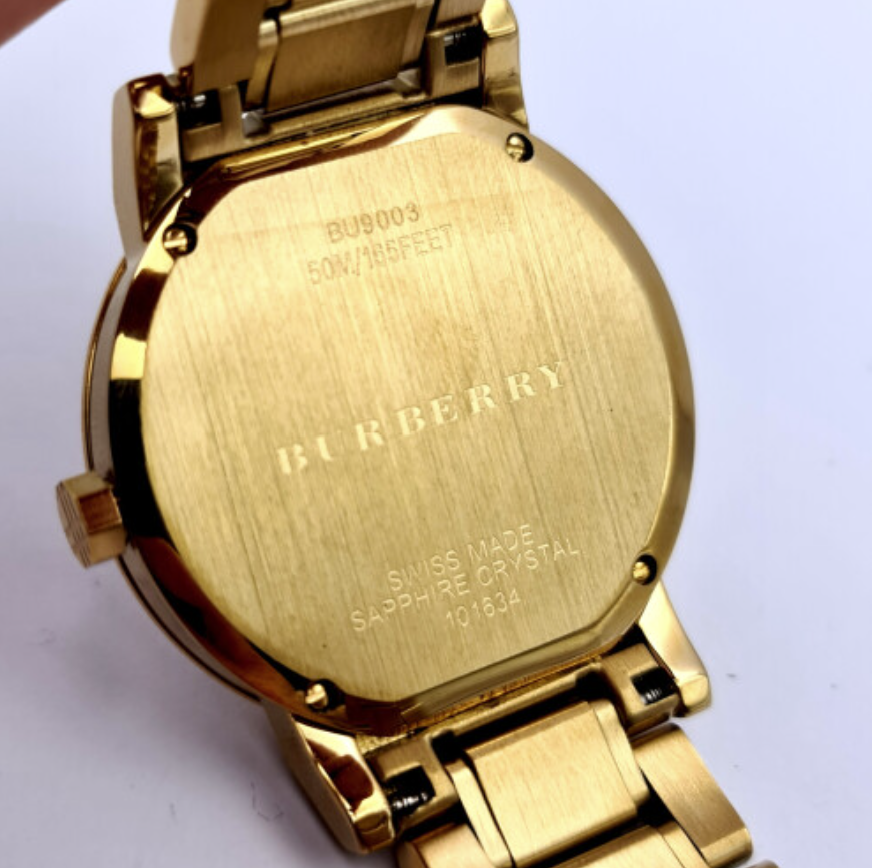 Reloj Burberry unisex dorado con estampado de cuadros BU9003