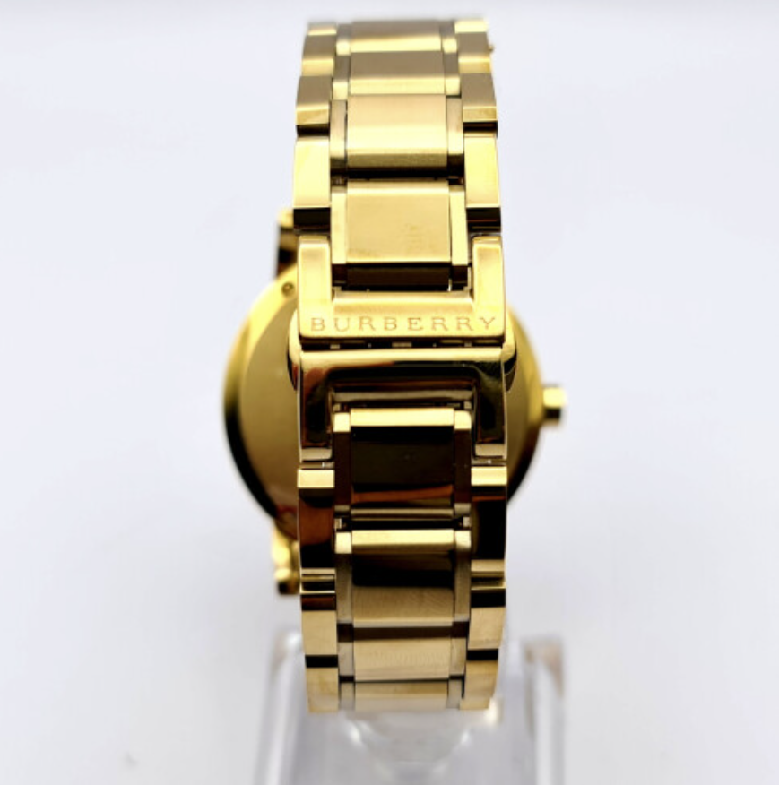 Reloj Burberry unisex dorado con estampado de cuadros BU9003